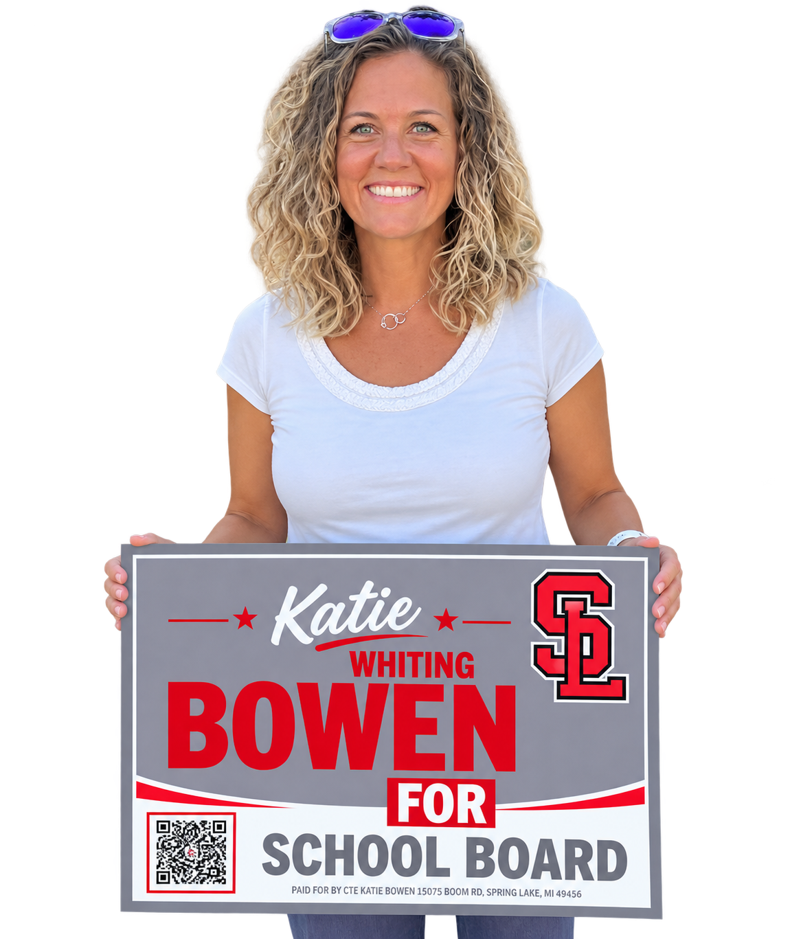 Katie Bowen holding a Katie Bowen for School Board campaign sign